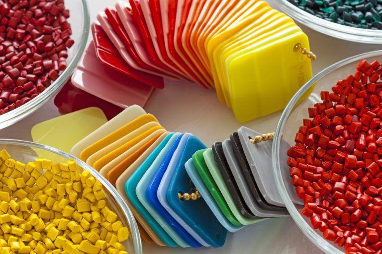 Polystyrene pigments in plastic coloring process