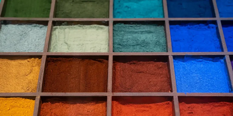 Colorful eco-friendly paint palette representing various halogen-free pigment options