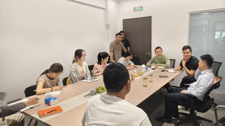 Fineland Chem Members Attending Fluorescent Pigment Training in Conference Room