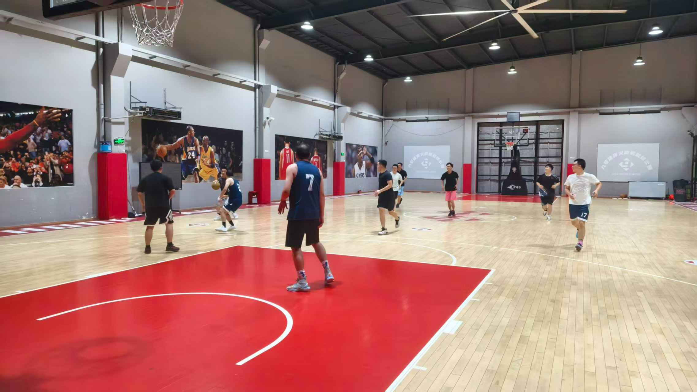 colleagues playing full-court basketball