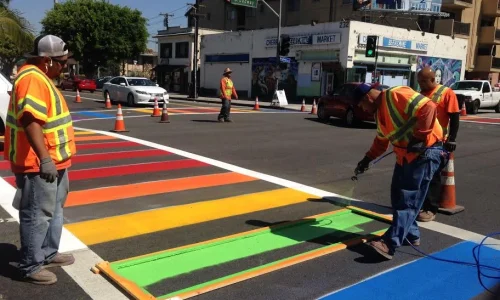 High visibility yellow pigment for road marking paint